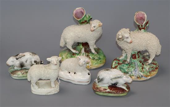 Two pairs of Staffordshire sheep and a pair of Staffordshire rabbits